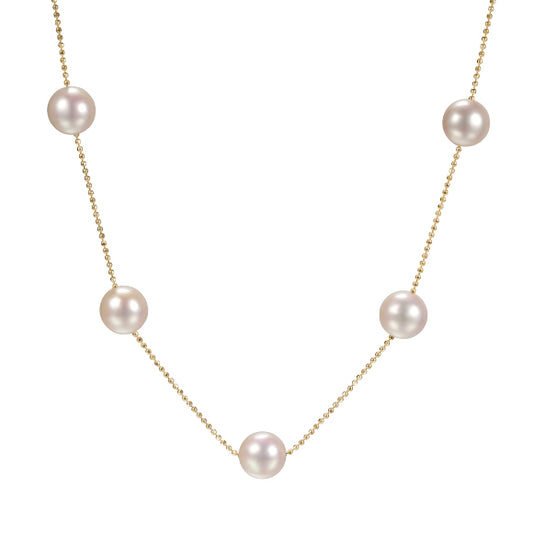 Collier Greta délicat en métal doré avec pendentif minimaliste, présenté sur fond clair pour un look raffiné.